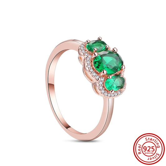 Anillo piedras verdes baño dorado