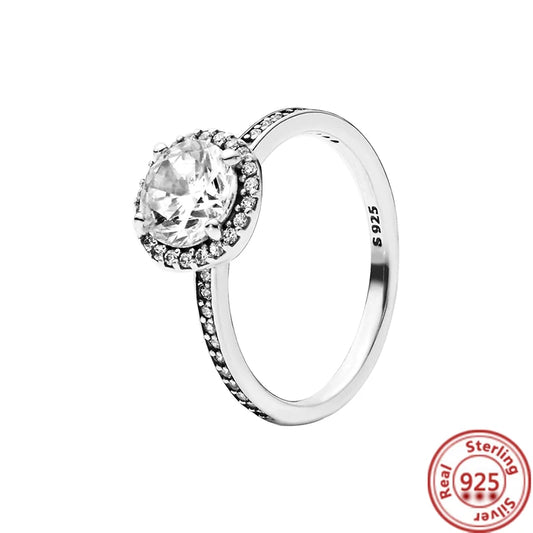 Anillo con piedra redonda y circonitas