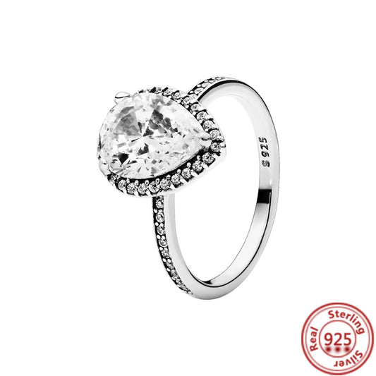Anillo con circonitas y piedra en forma de gota